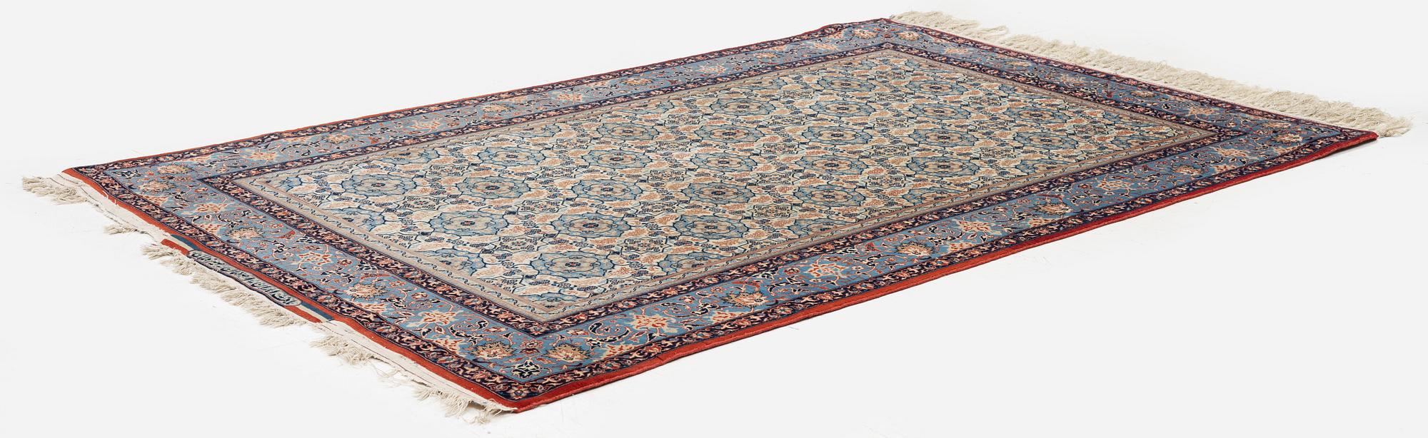A Isfahan rug, signed (Ali) Seirafian, c. 175 x 109 cm.