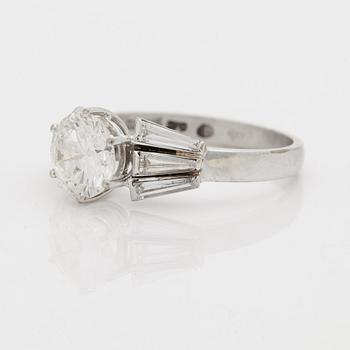 A RING set with a brilliant-cut diamond.