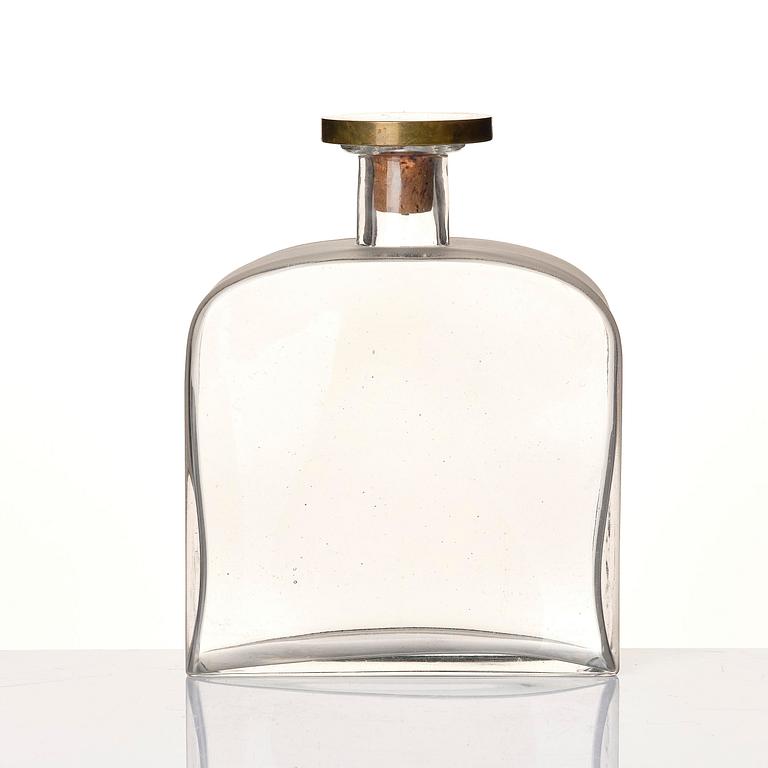 Firma Svenskt Tenn, a glass bottle model A 1608, with a pewter and brass stopper by Björn Trägårdh, Stockholm, 1930s.
