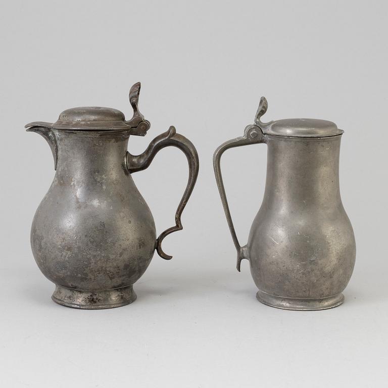 A PEWTER WINE JUG AND MUG, 18TH century.