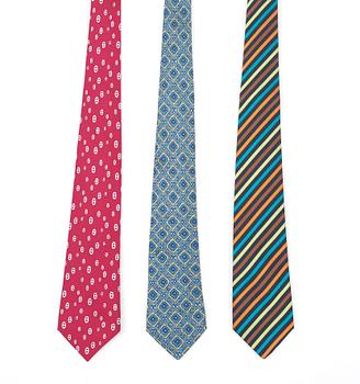 467. A set of three silk ties by Hermès.