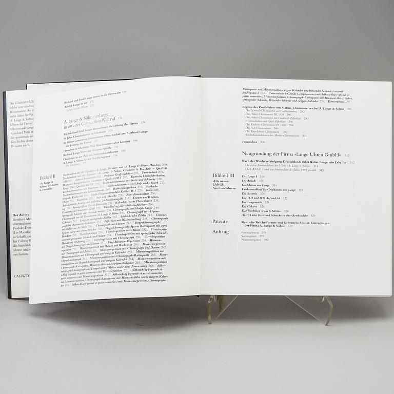 A set of 5 watch books.