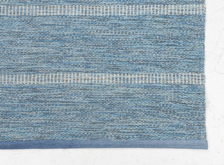 A flat weave runner, mid-20th century, c. 268 x 70 cm.