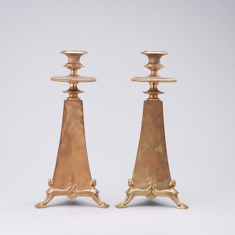 A pair of Melchior Wernstedt bronze candelsticks, Herman Bergman foundry, Stockholm 1920's.