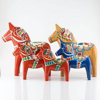 Dala horses, 4 pcs, and one wall-mounted, second half of the 20th century.