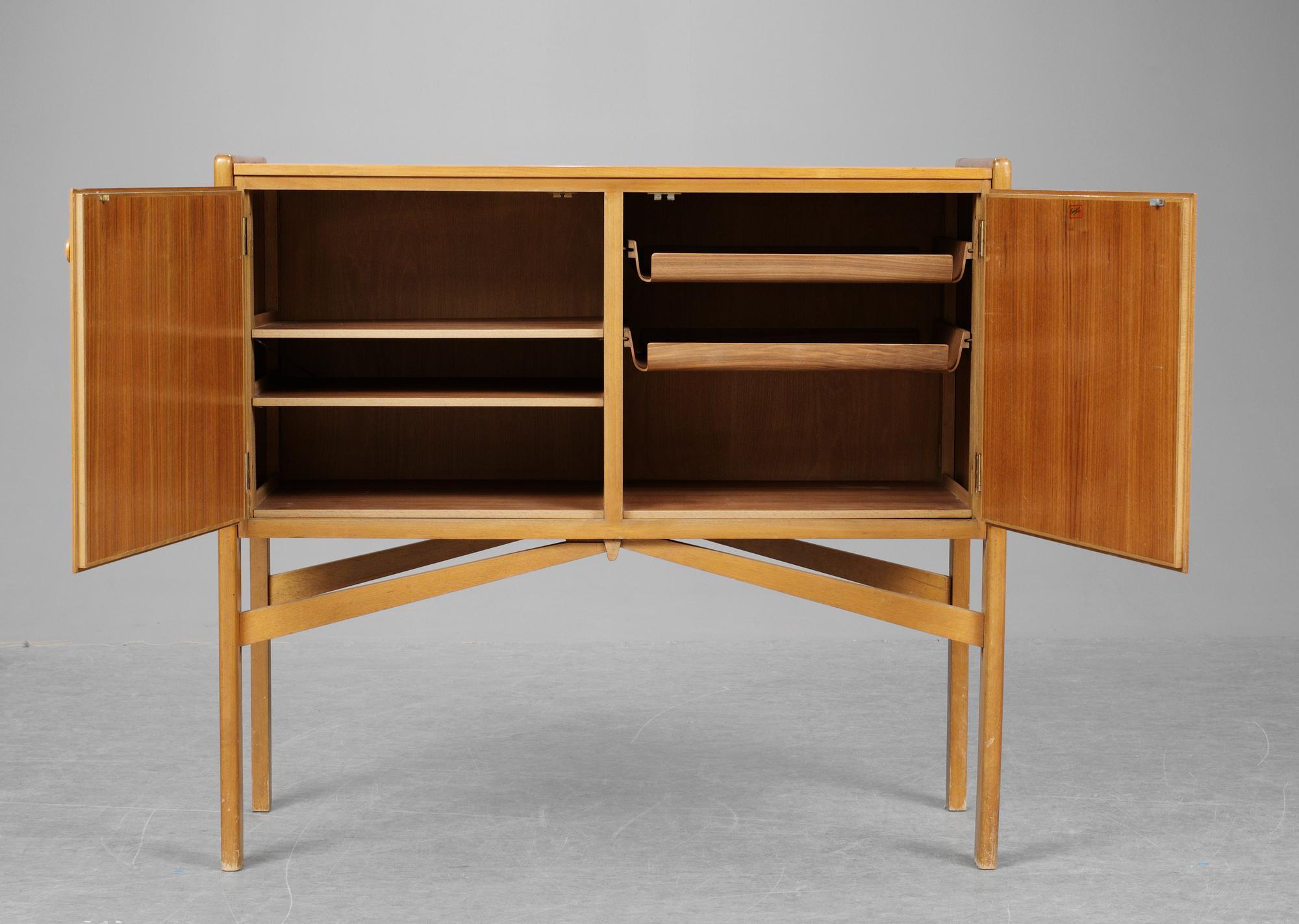 A Carl-Axel Acking teak and beech cabinet by Svenska Möbelfabrikerna Bodafors, Sweden.