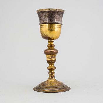 A brass chalice 18th century.