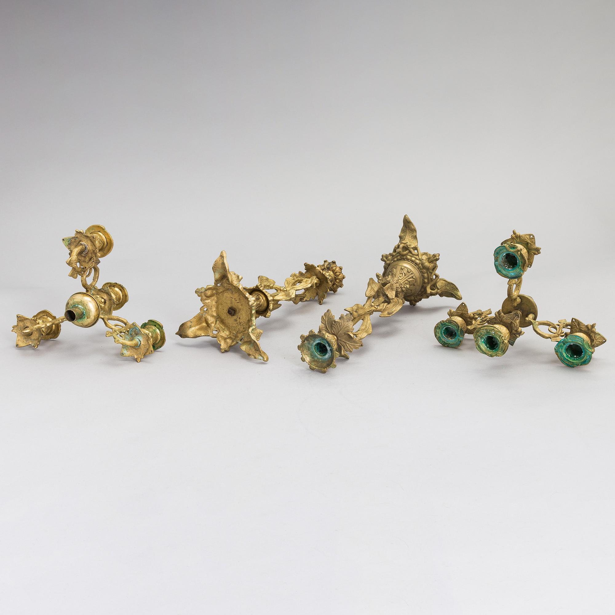 A pair of bronze candelabra from the latter half of the 19th Century.