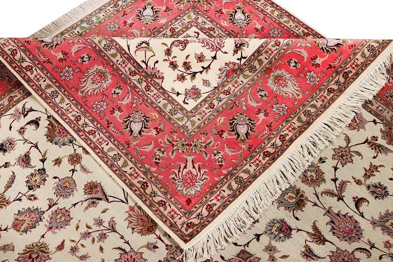 An old Tabriz carpet, part silk, 60 raj, c. 253 x 250 cm.