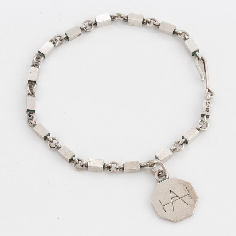 WIWEN NILSSON, silver bracelet with charm.