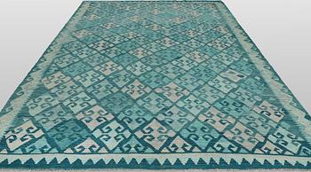A Kelim carpet, 350 x 245 cm.