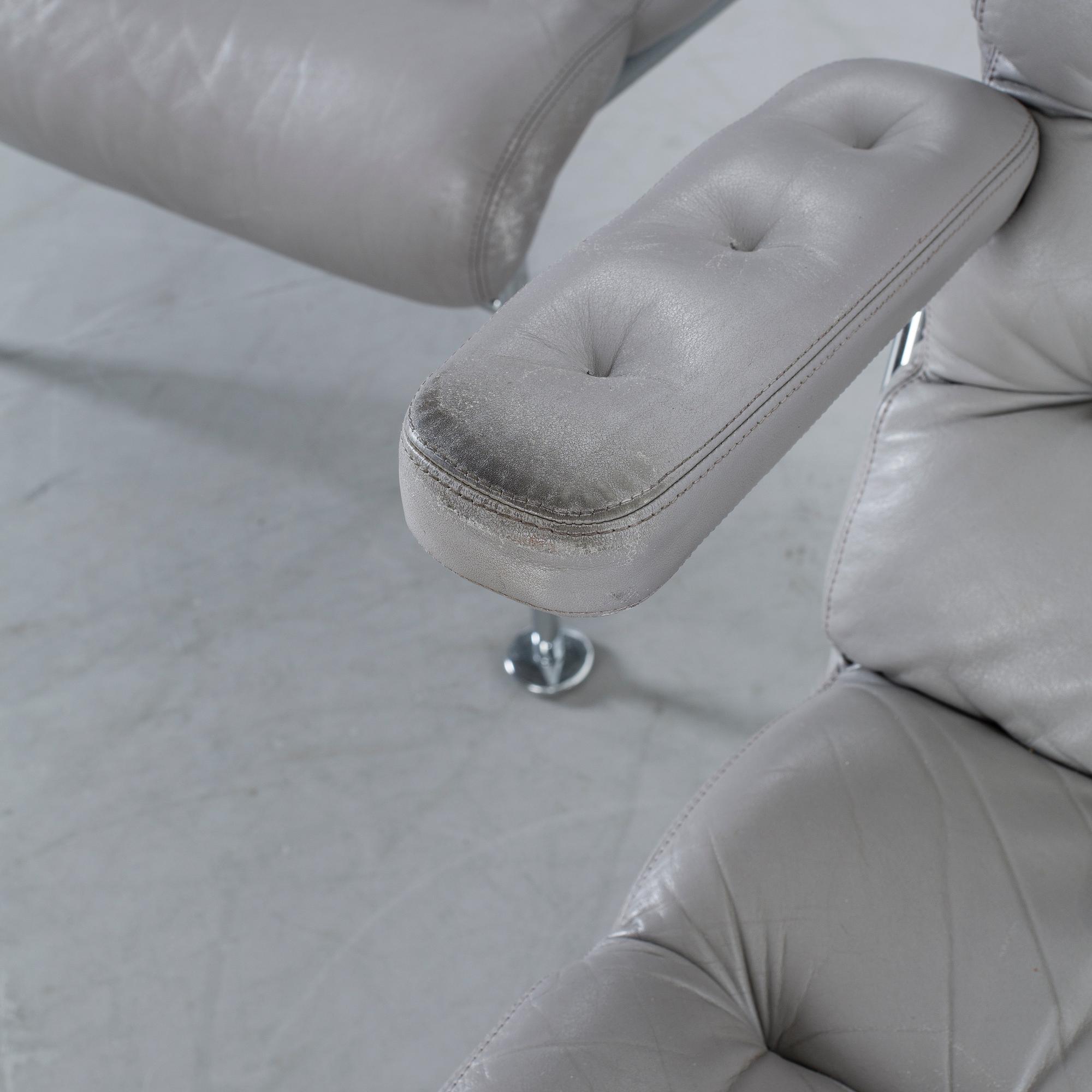 A COUPLE OF BRUNO MATHSSON ARMCHAIRS.