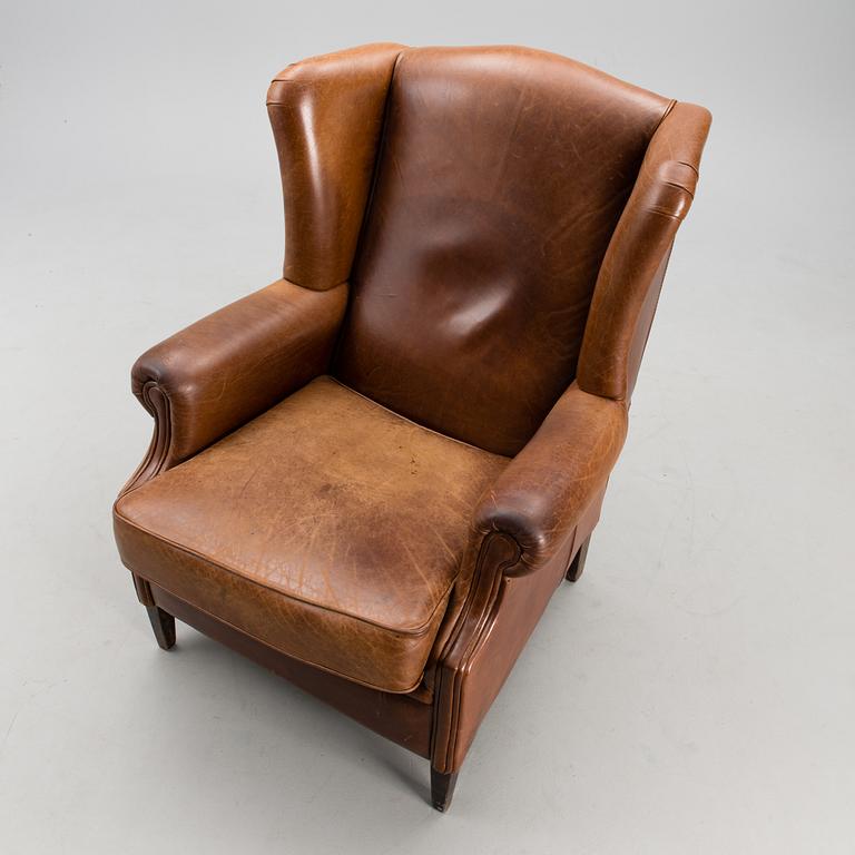 A late 20th century wing chair.
