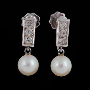 18K white gold pearl and white stone earrings, Stigbert.