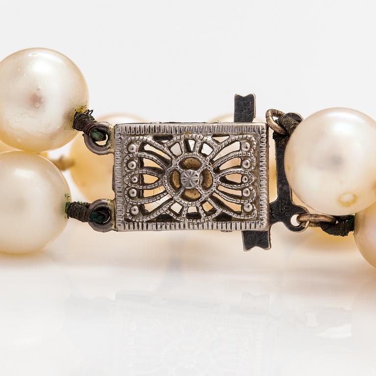 A 2-strand pearl collier with cultured pearls and a 14K white gold clasp.