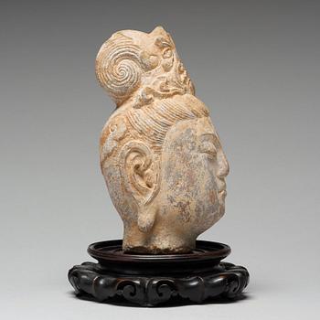 A stone sculpture of Guanyin, presumably Ming dynasty, 17th Century.