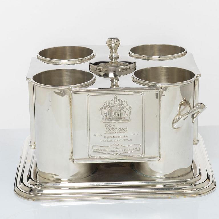 A silver plated four-bottle wine cooler.