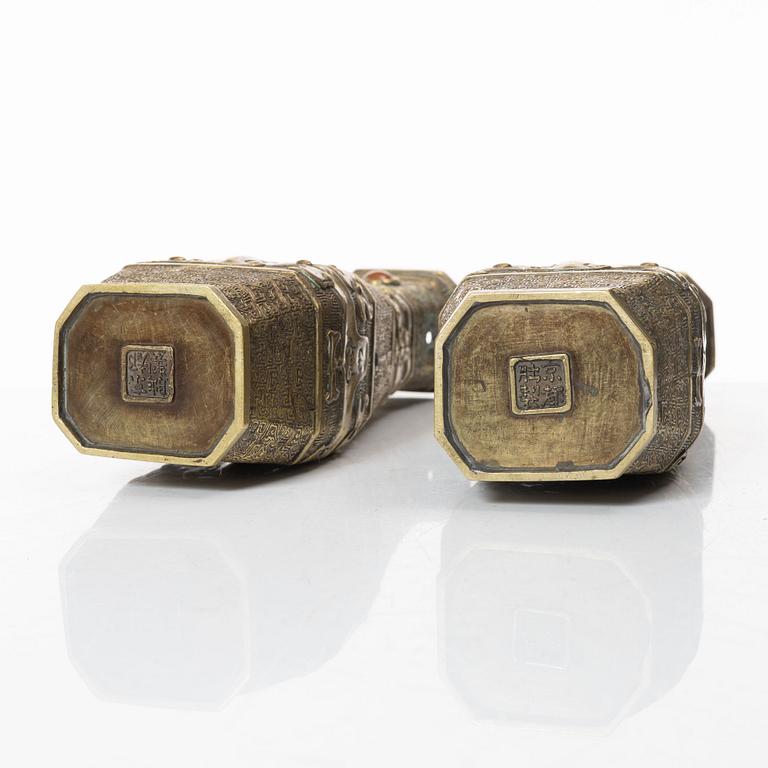 A pair of Chinese gilt bronze vases, Qing dynasty (1644-1912).