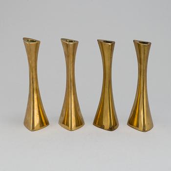 Four brass candle sticks by Karl Erik Ytterberg, 1960's.