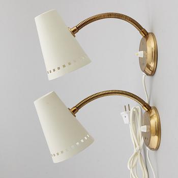 A pair of wall lights from Elidus, Fristad.