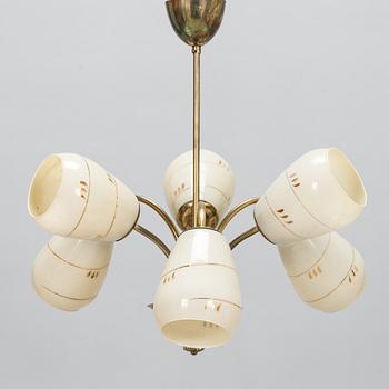 A mid-20th-century brass ceiling light, Finland.