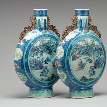 A pair of doucai moonflasks, Qing dynasty, 19th Century.
