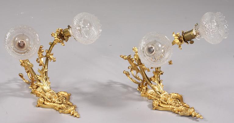 VÄGGLAMPETTER, ett par, Louis XV-stil, 1900-tal.