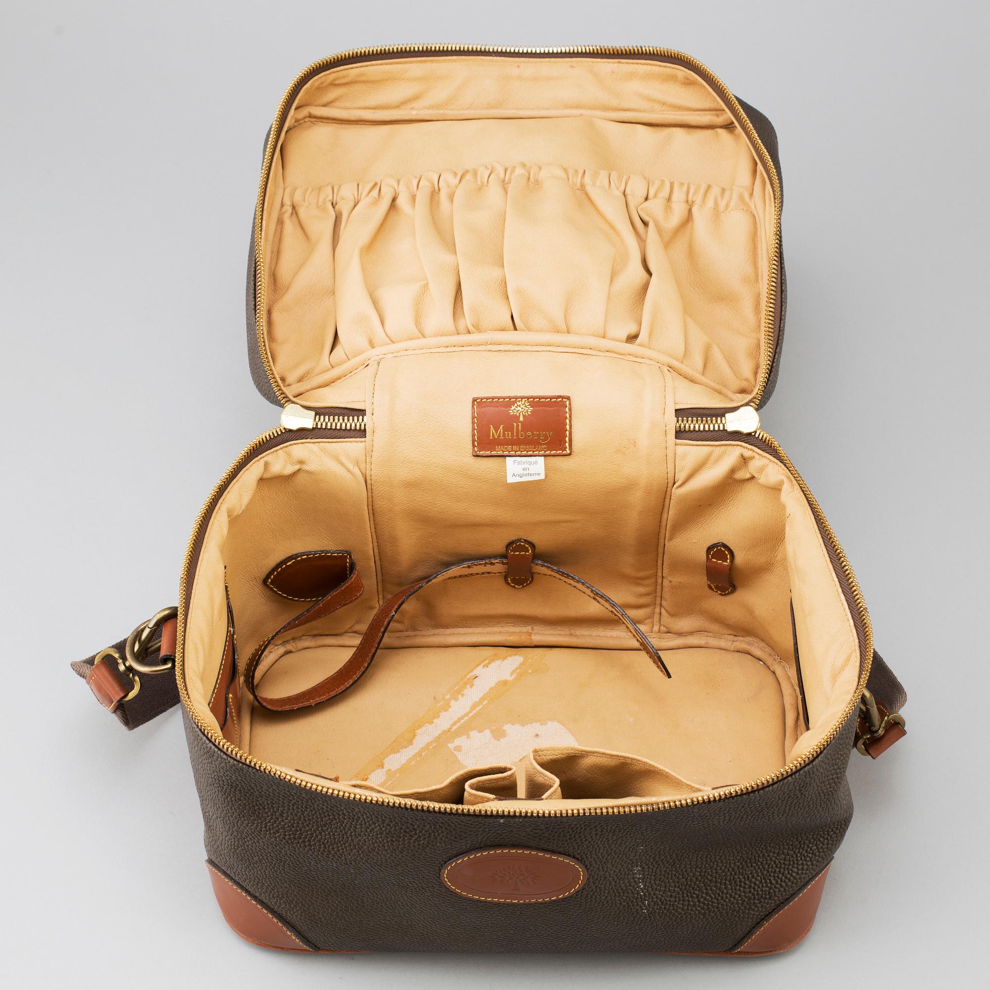 A Mulberry scotchgrain beautybox and travel wash case.