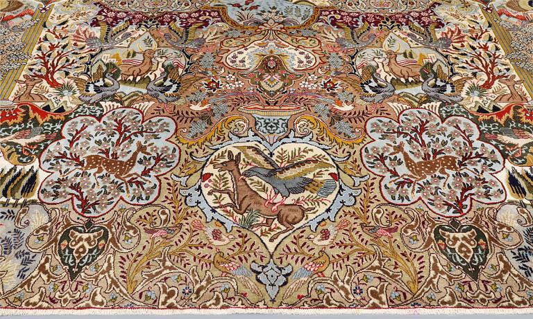 A Kashmar carpet, approx. 391 x 293 cm.