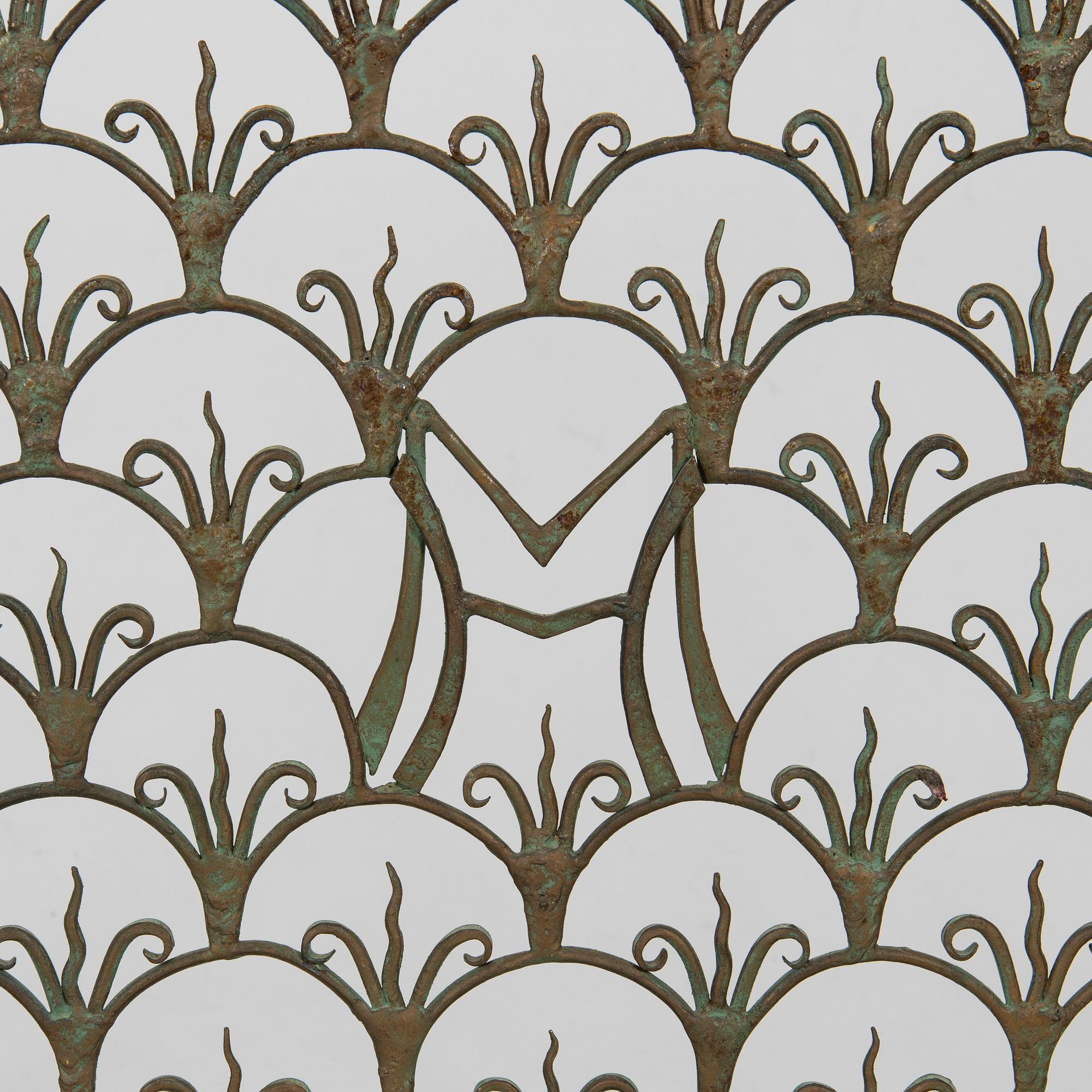 A radiator cover, metalwork, likely Taidetakomo Hakkarainen, 1930s.