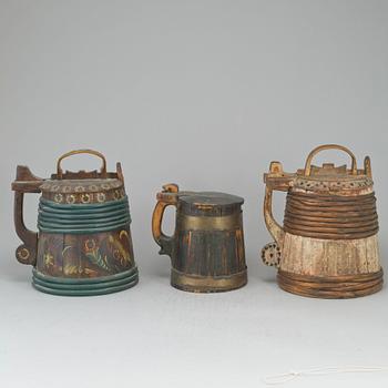 Three painted wooden jars from the 19-20th century.