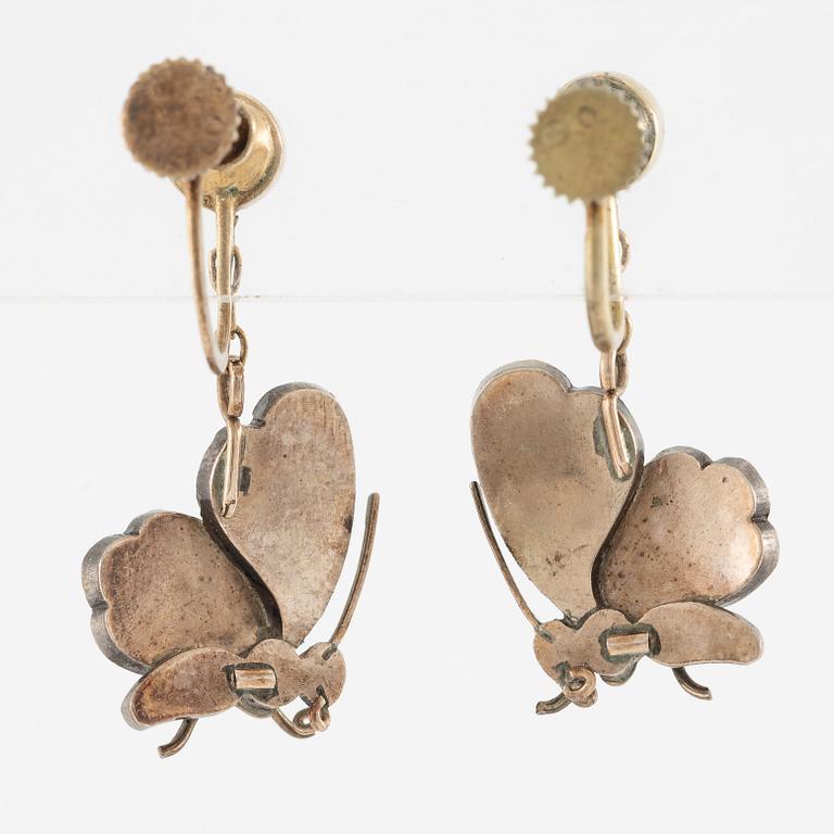 Brooch/pendant and earrings, in the form of butterflies, silver with turquoises and pearls.