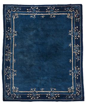 306. A carpet, a semi-antique China, ca 293-295 x 242-246,5 cm.