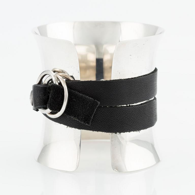 Georg Jensen, a bangle, sterling silver with leather strap, Denmark.