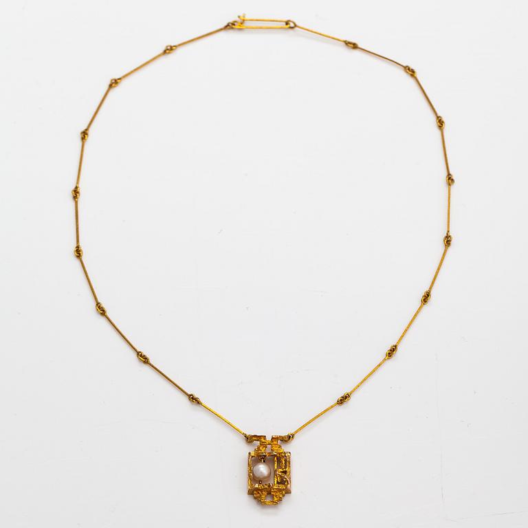 Björn Weckström, "Magic pearl", an 14K gold necklace with a cultured pearl. Lapponia 1972.