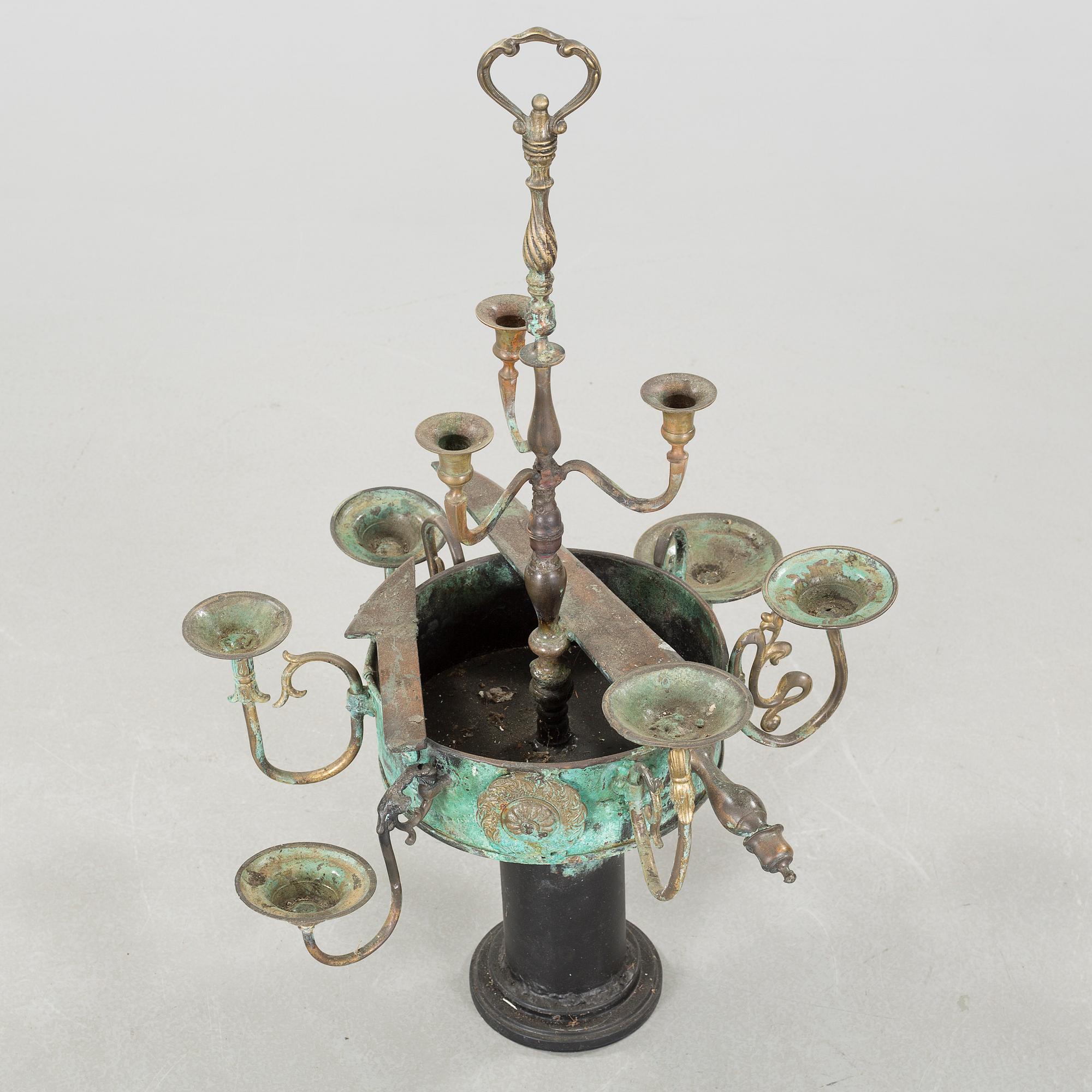 a metal sculpture, signed.