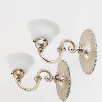 A pair of silver-plate wall lamps, C.G. Hallberg, 1920's.