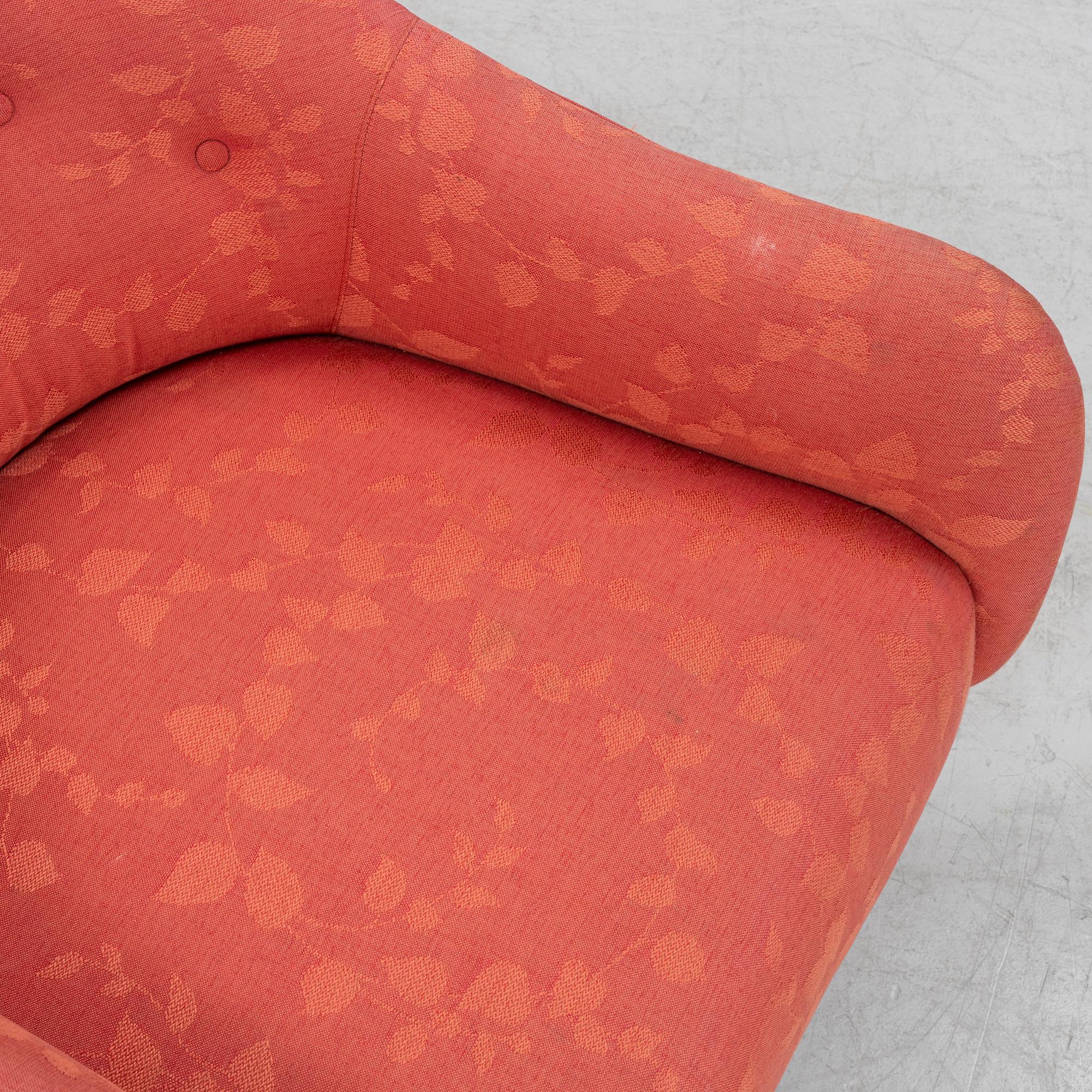 A pair of armchairs, later part of the 20th Century.