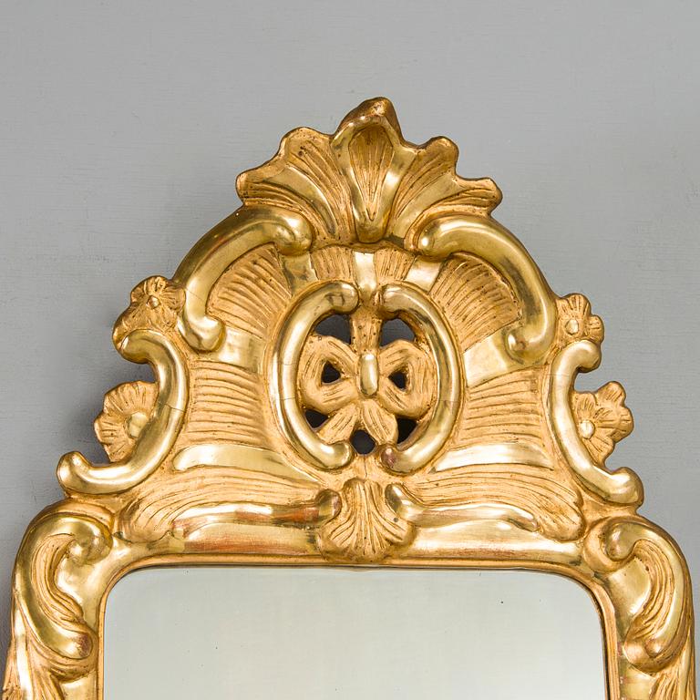 A Rococo mirror sconce, 18th Century.