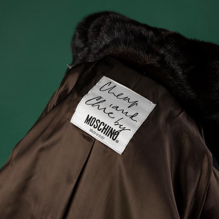 A jacket by MOSCHINO, in size 44(IT).