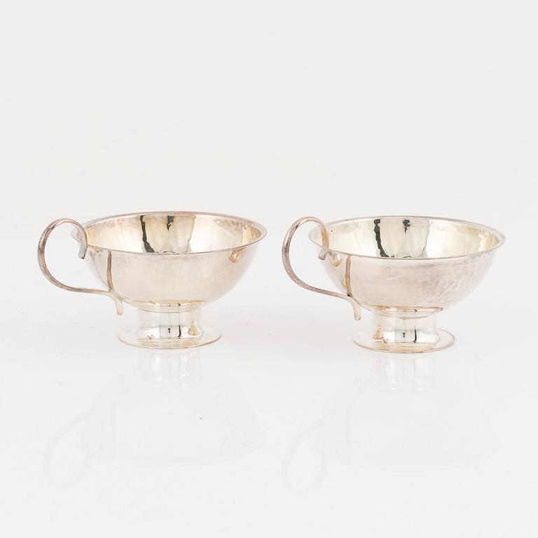 Twelve Swedish silver punsch mugs, including Gufa Gundefeldt & Falk, Gothenburg 1959.