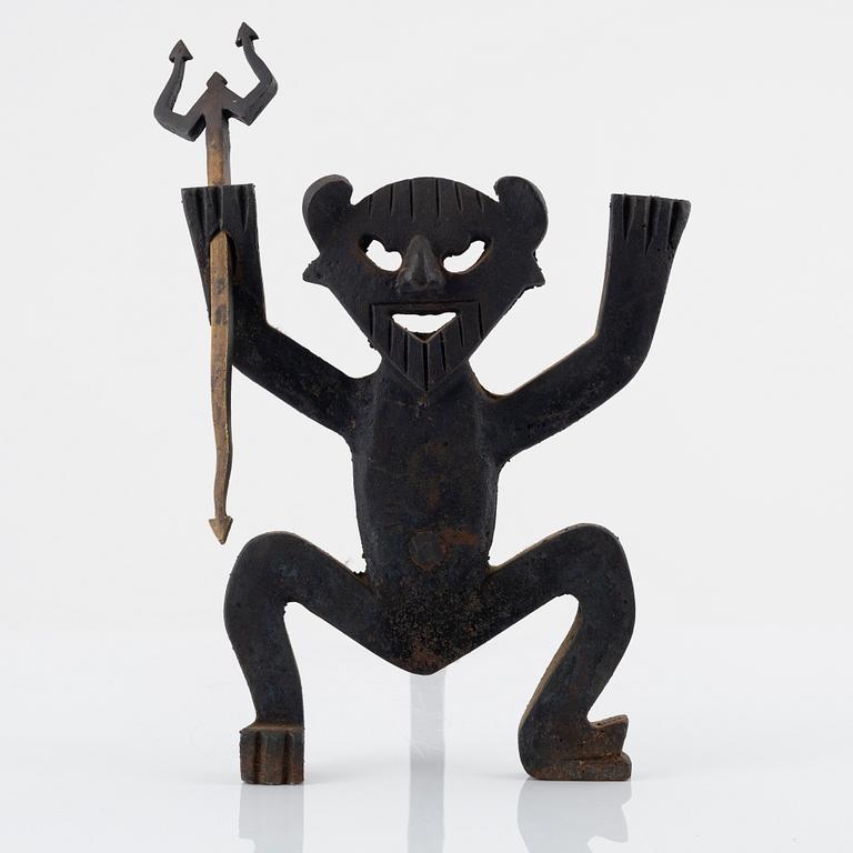 A cast iron fire dog by Eskil Björklund, second half of the 20th century.