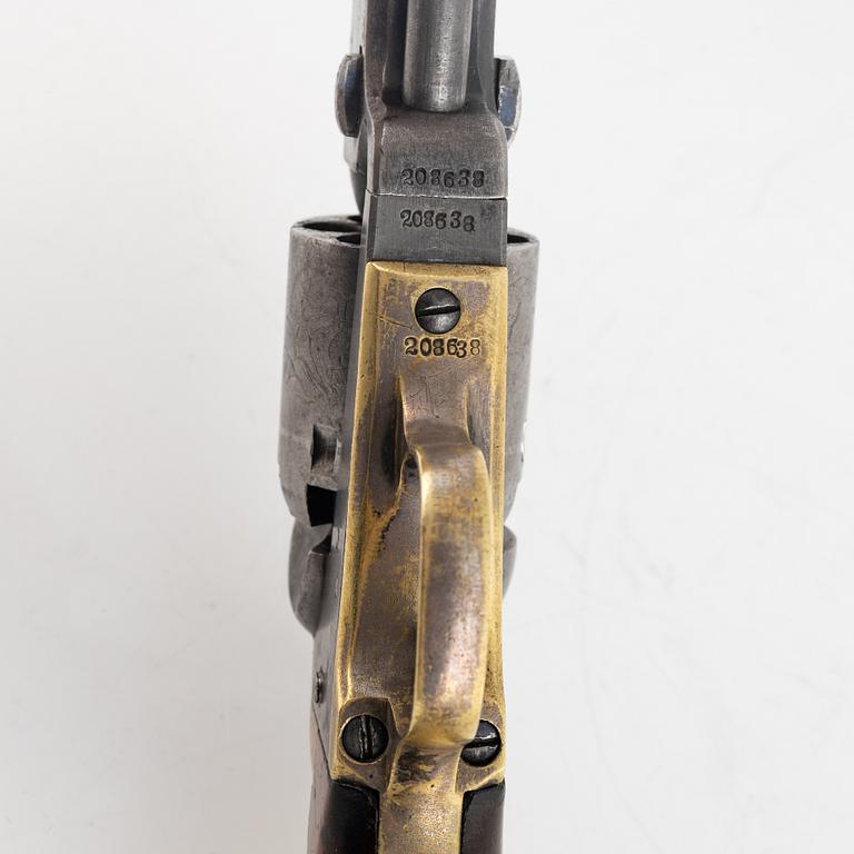 A Colt 1849 Pocket Revolver.