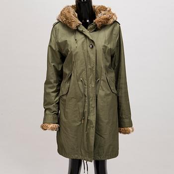 Ladies Woolrich Military Parka in size L.