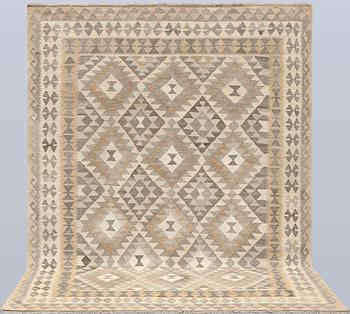A Kilim rug, approx. 296 x 183 cm.
