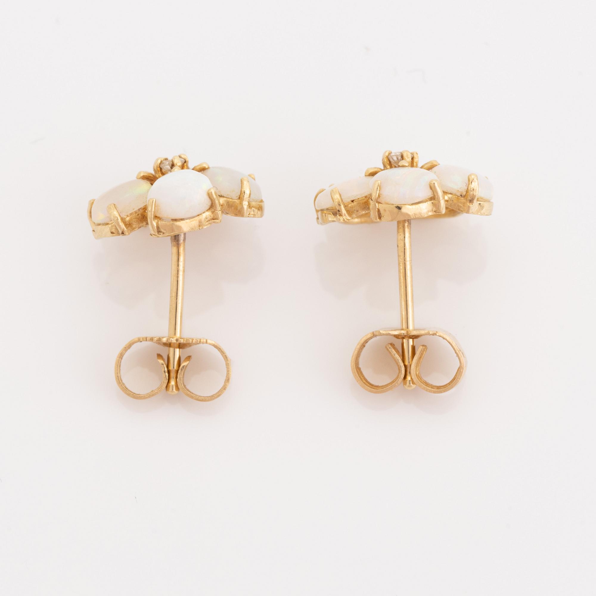 Opal and brilliant cut diamond earrings.