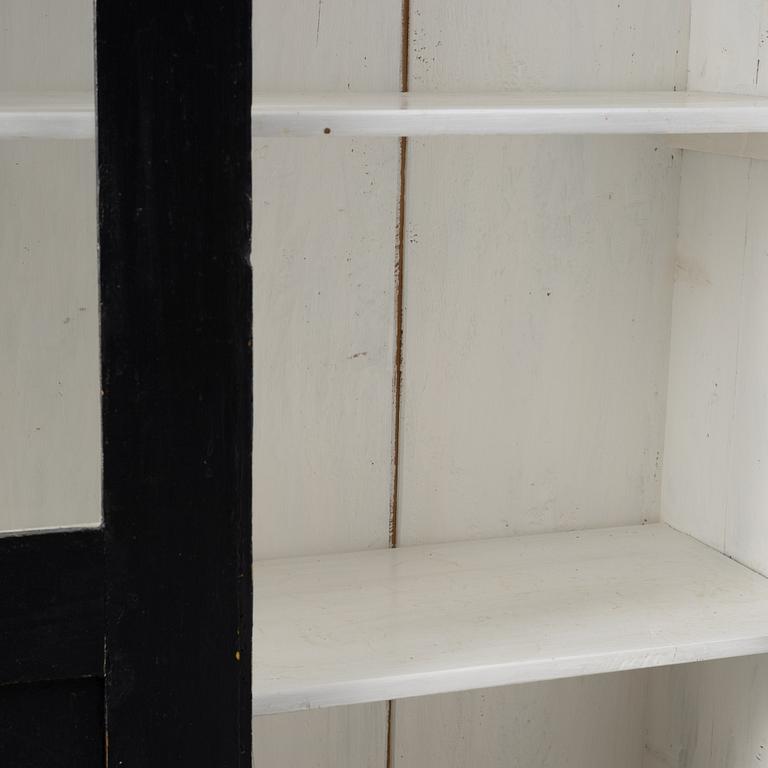 Display cabinet, circa 1900.