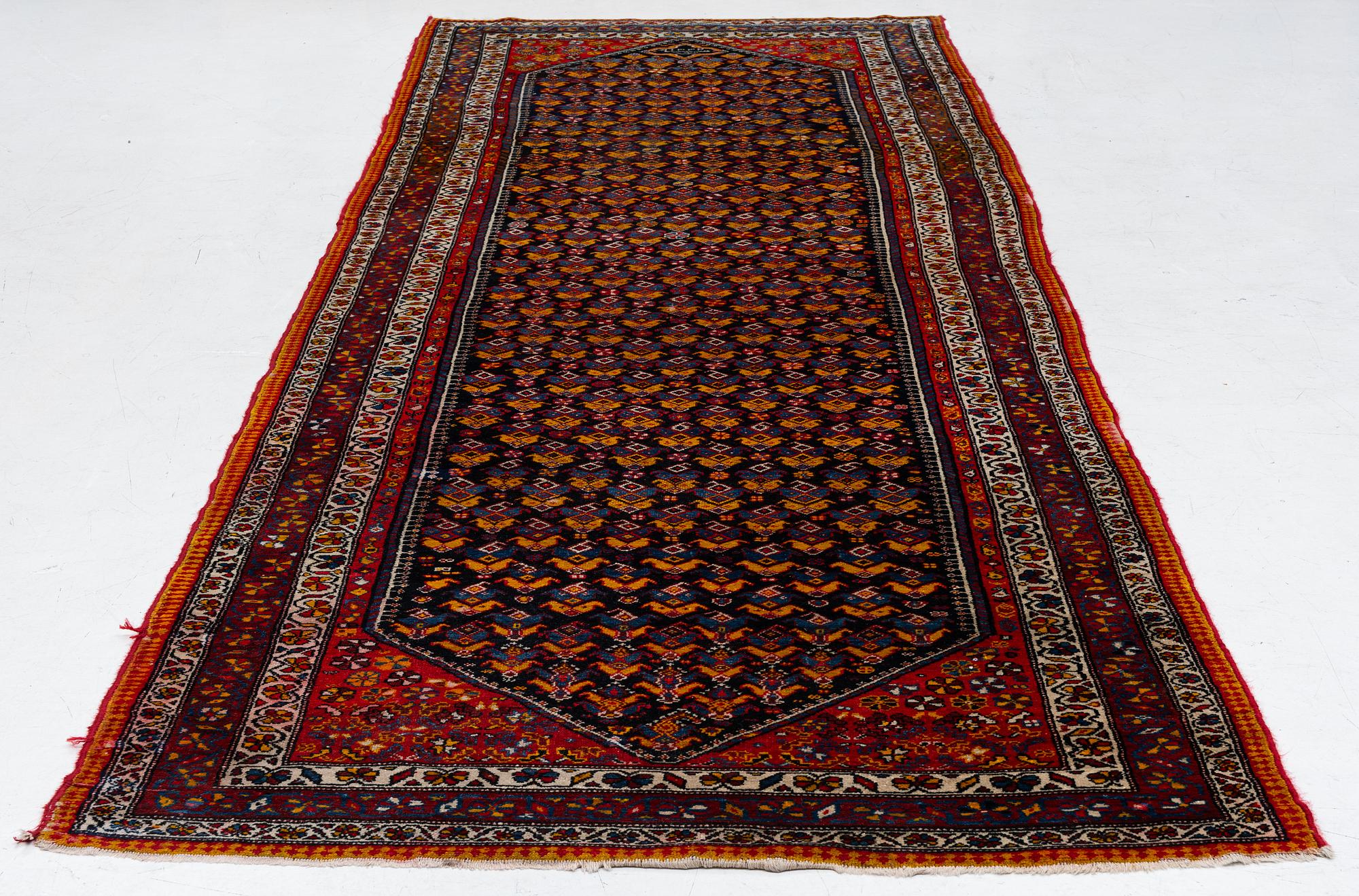 A semi-antique Hamadan, Western Persia, c. 421 x 145 cm.