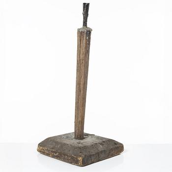 A candle stick, 19th/20th Century.