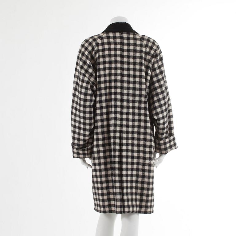 EMMANUELLE KHANH, a black and white wool coat.